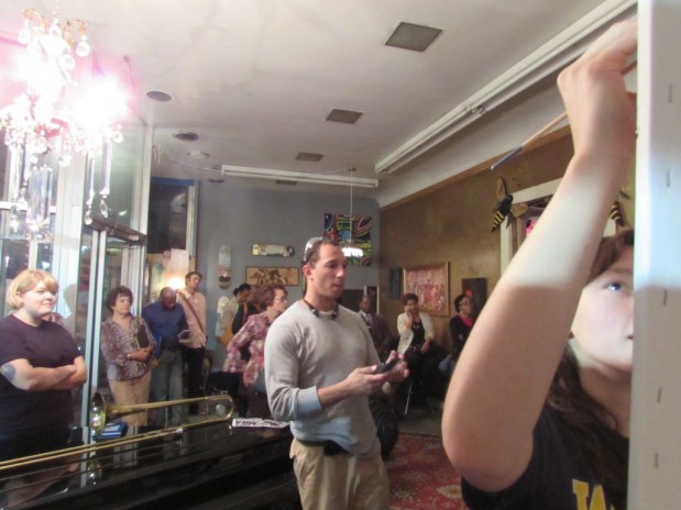 Blue Route staff member Kim Roberts takes her turn with a brush.